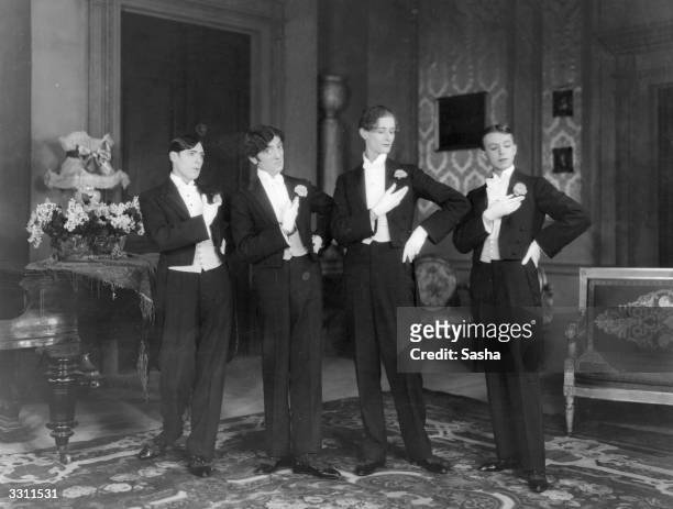 Four men dressed in tuxedos and tails, performing in 'Bitter Sweet' at His Majesty's Theatre.