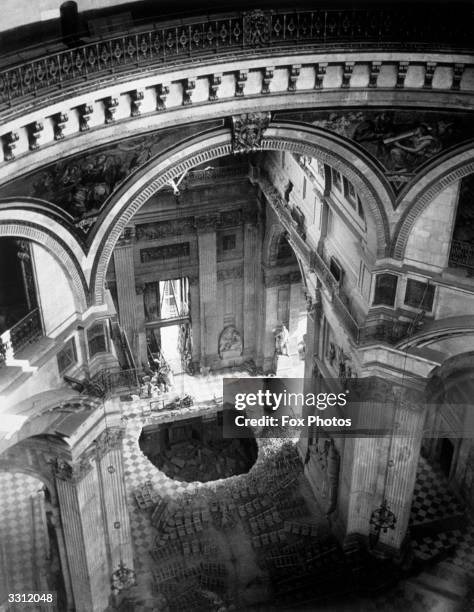 The interior of St Paul's Cathedral, London, after suffering bomb damage.