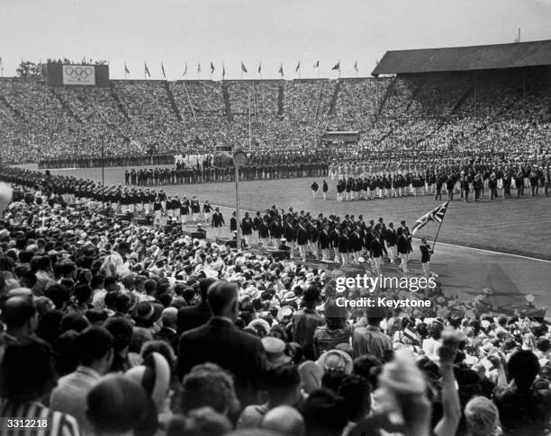 The British team enters Wembley Stadium, London, during the opening ceremony of the Olympic Games.