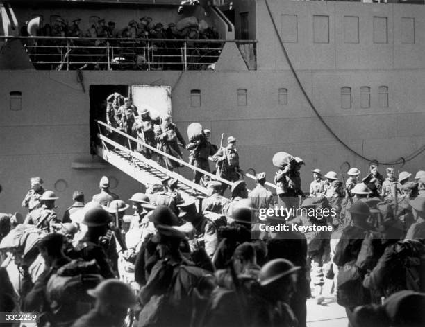 Soldiers from the British Expeditionary Force, , returning from France, after the evacuation of Dunkirk.