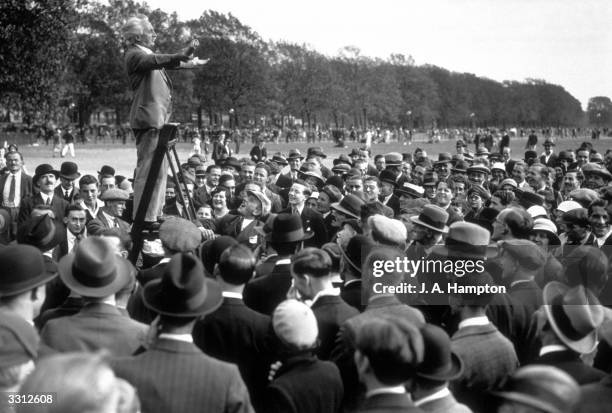 The famous speaker 'Charlie' addresses a crowd at Speaker's Corner, Hyde Park, London.