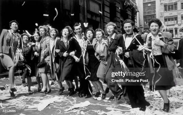 People dancing in the streets of London during the celebrations for VE Day. Original Publication: Picture Post - 1991 - This Was VE Day In London -...