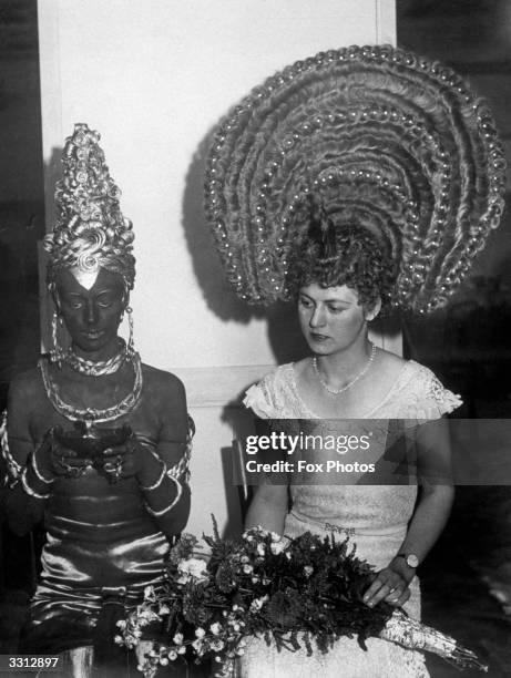 The first and second prize winning hairstyles in the fantasy competition at the Hairdressers Fair, Olympia, London. The one on the left is made...