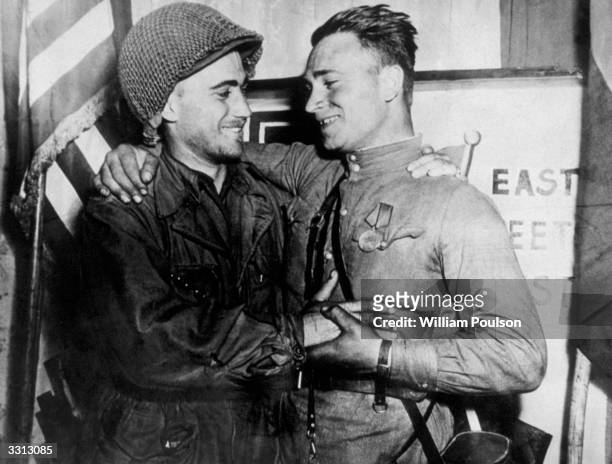 American GI Lt William Roberston greets Russian soldier Lt Alexander Sylvashko, as the historic meeting of the two armies near Torgau on the Elbe.