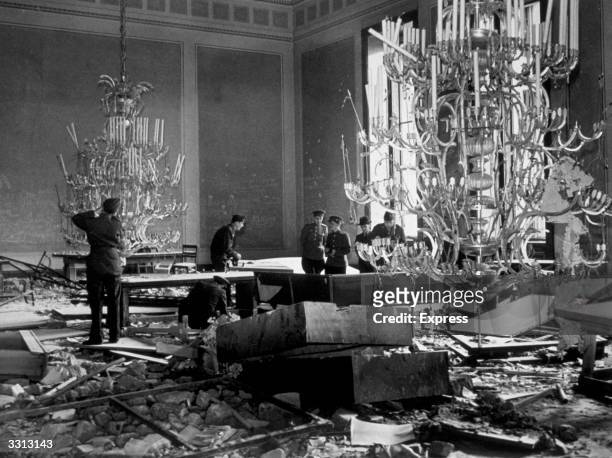 Russian troops in the treaty room at the Chancellery in Berlin, where the huge chandeliers hang nearly to the floor.