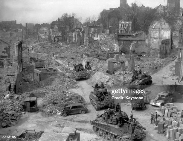 Tanks of the 76th Tank Battalion move into the old walled inner city of Nuremberg.