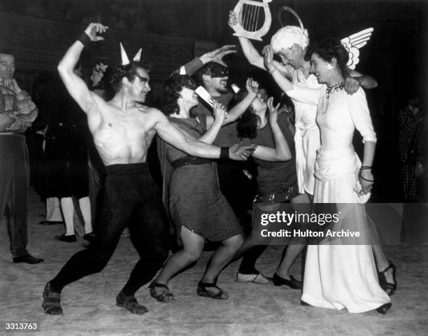 The Royal College of Art performs their tableau, 'Dante's Inferno' at the Chelsea Arts Club annual New Year's Ball at the Royal Albert Hall, London.