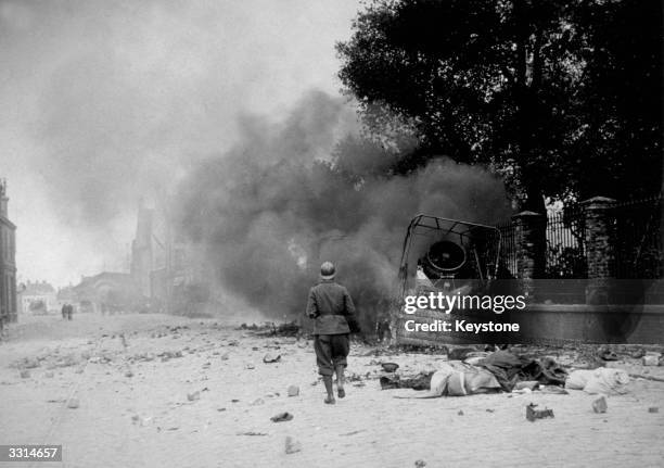 The town of Dunkirk, under bombardment.