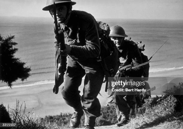 Marines take part in an invasion training exercise. Original Publication: Picture Post - 312 - We Prepare For Our Invasion - pub. 1940