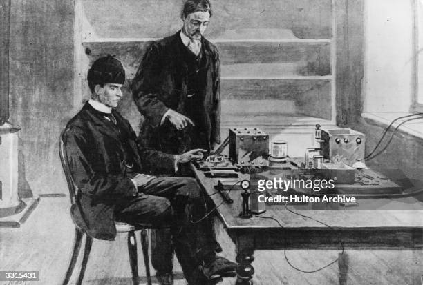 Guglielmo Marconi , the Italian physicist and inventor and his assistant, receiving the first transatlantic message by wireless telegraphy, at Signal...