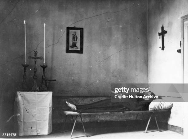 Carmelite nun at rest in her cell.