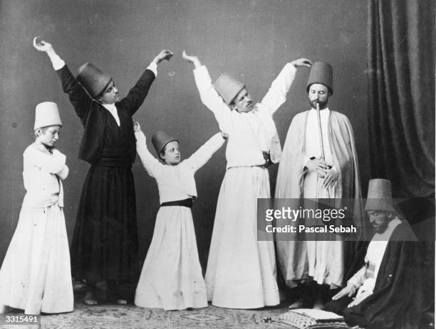 Group of dervishes begin their dance known as the dance of the Whirling Dervishes. One year earlier British troops had massacred 1,000 Dervishes in...