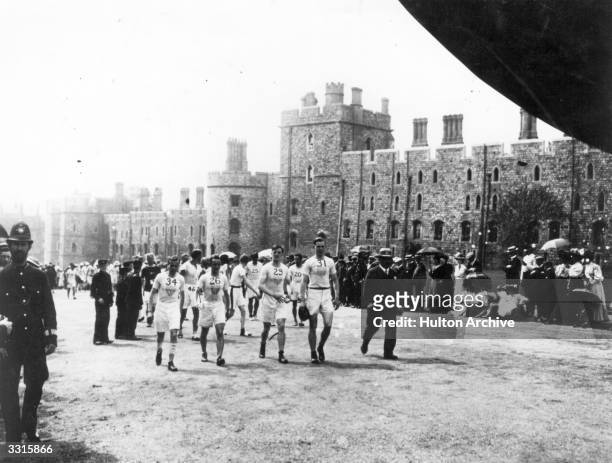 Competitors in the Marathon at the 1908 London Olympics enter Windsor Castle for the start of the race.