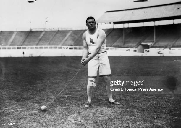 Matthew McGrath of the USA about to throw the Hammer at the 1908 London Olympics. He was the World Record holder at the time but finished second to...