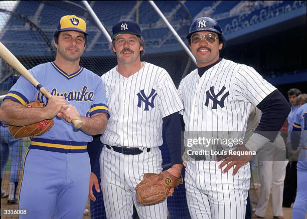 Sal Bando of the Milwaukee Brewers and Jim "Catfish" Hunter and Reggie Jackson of the New York Yankees pose for a portrait circa 1978-1979 in Yankee...