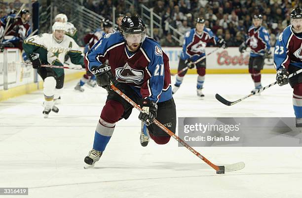 Peter Forsberg of the Colorado Avalanche breaks away against the Dallas Stars in the third period of game two of the first round of the Stanley Cup...