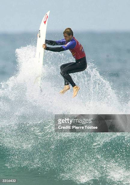 Troy Brooks of Australia performs a superman move in the Fosters Expression Session of the Rip Curl Pro at Bells Beach April 10, 2004 in Torquay,...