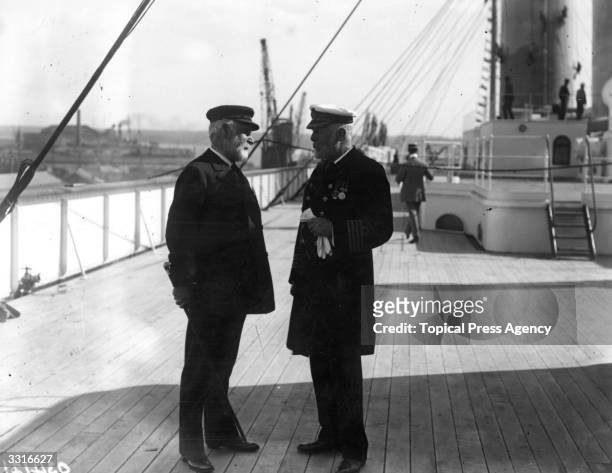 Lord Pirrie and Captain Smith, later captain of the ill-fated 'Titanic', aboard the White Star liner 'Olympic' at Southampton.