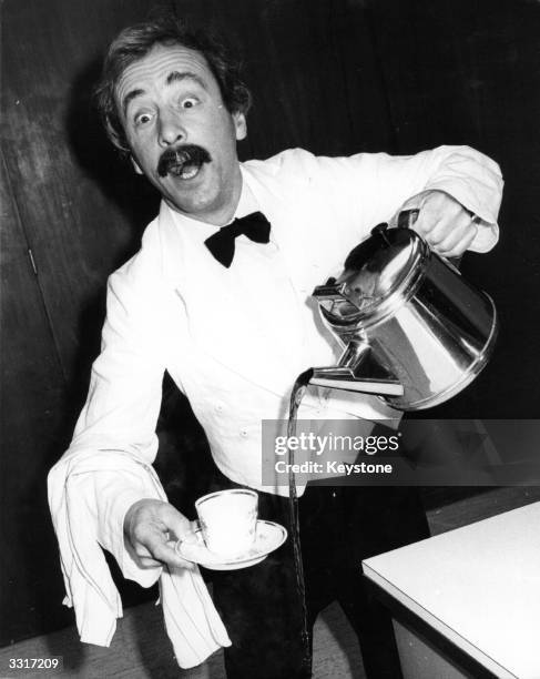 The world's worst waiter, Manuel from TV's 'Fawlty Towers', played by actor Andrew Sachs, demonstrates how much he needs to heed the advice contained...