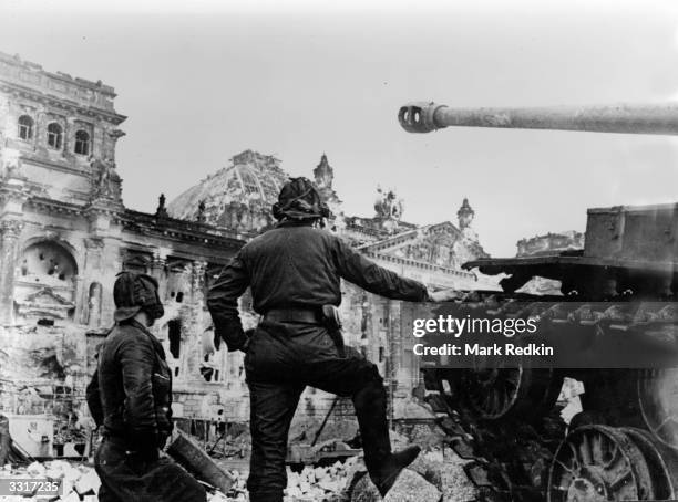 Soviet tank faces the badly damaged Reichstag building in Berlin where the last desperate pocket of German resistance was finally crushed.