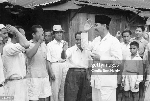 Indonesian statesman Achmed Soekarno , president of Indonesia, visiting his people. Original Publication: Picture Post - 4749 - The Struggle For...