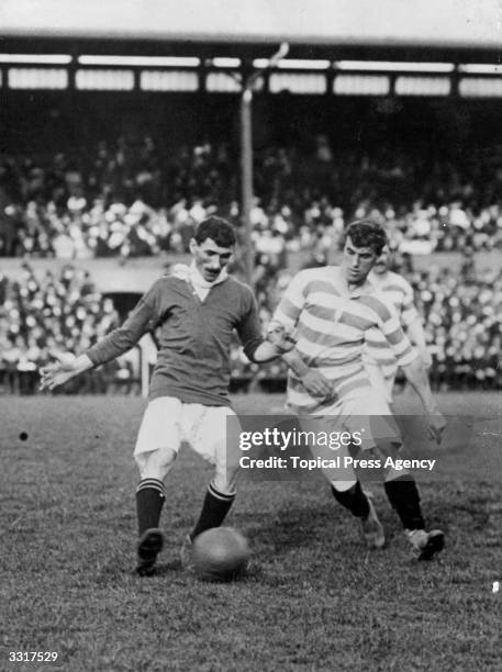 Billy Meredith of Manchester United in action during the first ever FA Charity Shield match against Queens Park Rangers. Following a 1-1 draw, United...