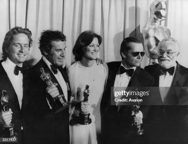 Left to right - Michael Douglas, Milos Forman, Louise Fletcher, Jack Nicholson and Saul Zaentz holding their Oscar awards for the film 'One Flew Over...