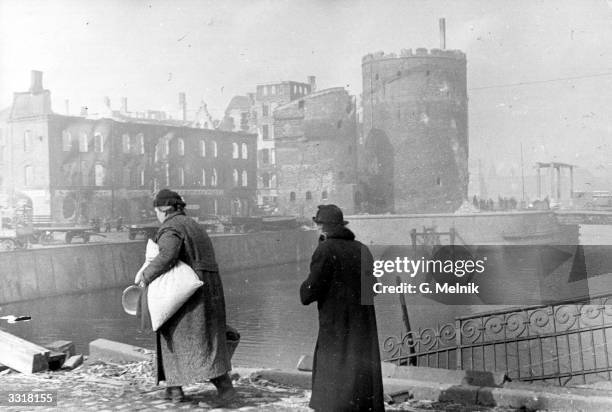 After the fighting two civilians return home to bomb-damaged Gdansk.