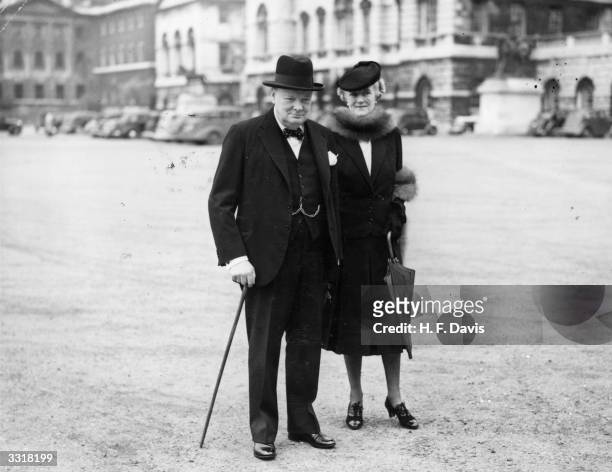 Winston Churchill and his wife Clementine, on their way to No 10 Downing Street where they are to take up their official residence on his becoming...