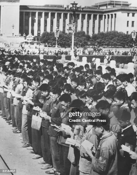 Red Guards reciting in unison as they read from Chairman Mao Tse Tung's works in front of the Cenotaph to the People's heroes in Tiananmen square,...
