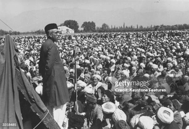 Sheik Abdullah, leader of the Kashmiri government in Srinagar, addressing a prayer meeting in Gandhi Park. He is in favour of an independent Kashmir...