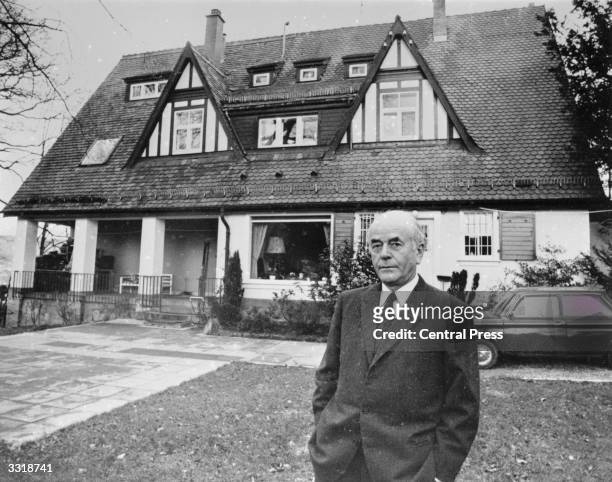 German architect and Nazi government official Albert Speer in front of his home at Heidelberg.