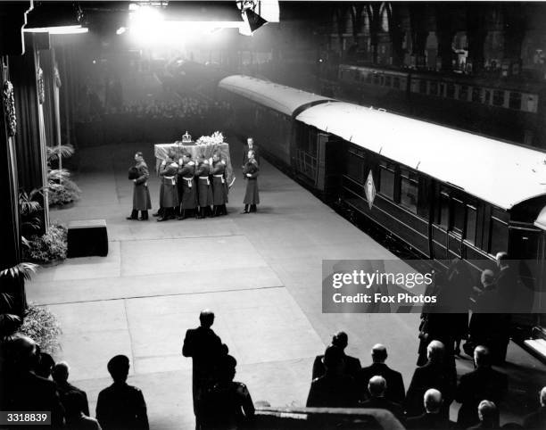 The coffin of King George VI arrives at King's Cross Station, London, from Sandringham, 11th February 1952. The king's coffin will be drawn in...