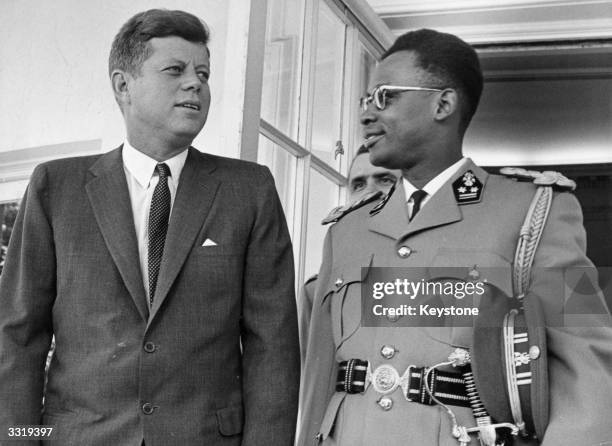 Statesman John F Kennedy , 35th president of the USA, and Zairean soldier and politician Mobutu Sese Seko, previously Joseph Desire Mobutu,...