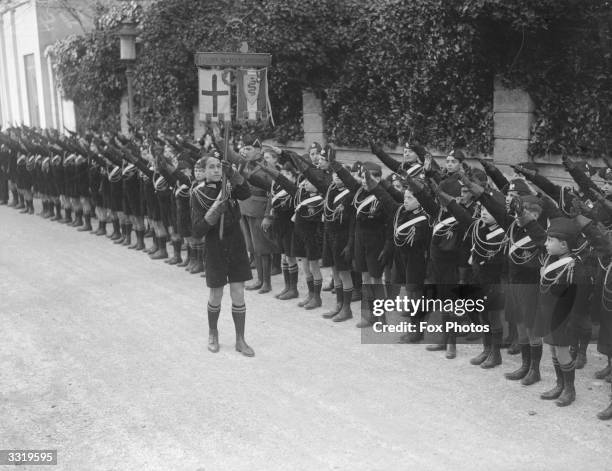 Young Fascists in black uniforms are to give a display of Italy's youth under arms to the British Prime Minister Neville Chamberlain and the Foreign...