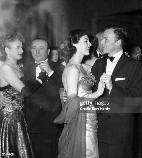 Frank Sinatra and Ava Gardner dancing at a party hosted by the Duke of Edinburgh for the friends and members of the Variety Club of Great Britain and...