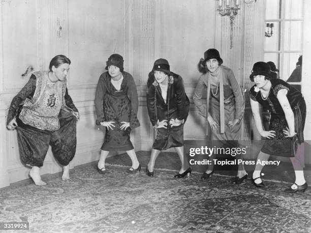Group of ladies learning 'The Charleston', dance.