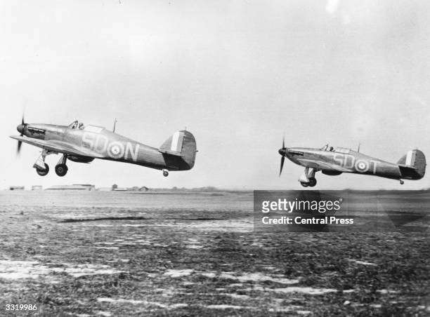 Hawker Hurricane MkI monoplane fighters of No 501 Squadron Royal Auxiliary Air Force take off for another sortie during the Battle of Britain having...