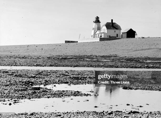 Lighthouse on a beach near Halifax, Nova Scotia.