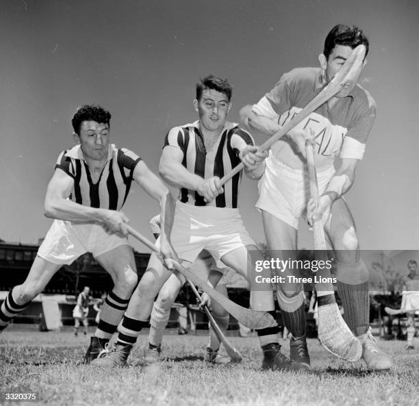 Players tussle for possession of the ball during a hurley match between Offaly and Kilkenny at New York's Croke Park, the home of hurling in the US.