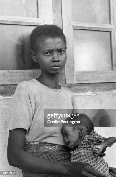 Biafran mother and her starving baby during the famine resulting from the Biafran War in the Republic of Biafra.