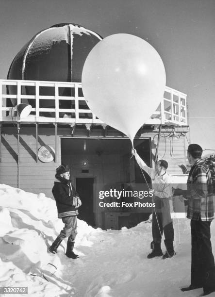 Weather balloon being released at a weather station in the Arctic.