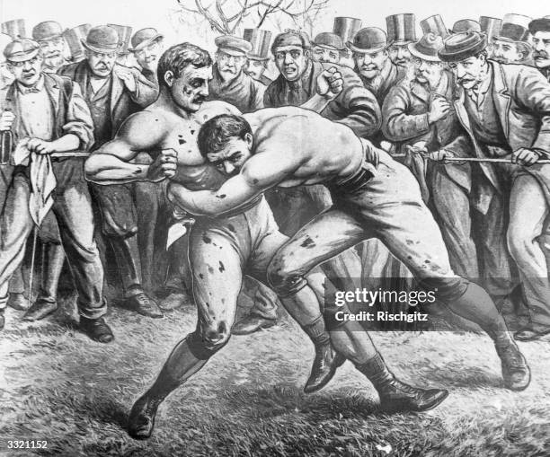 English boxing champion, Tom King, being crushed in a rib cracking hold before being thrown by John Heenan of the USA in the sixth round of their...