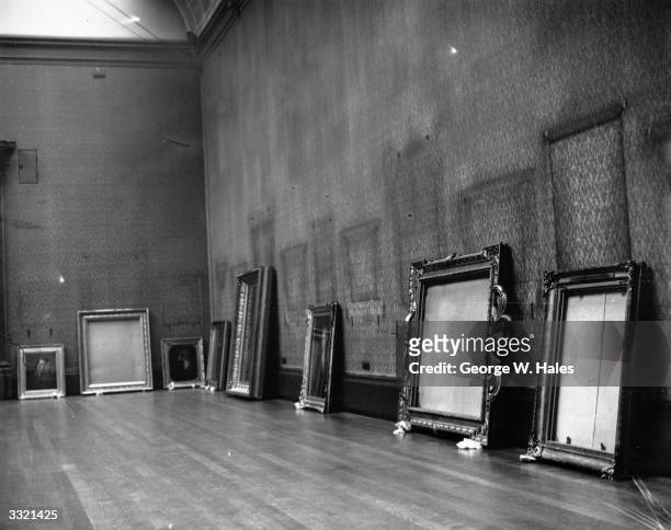 Pictures and empty frames on the floor of the National Gallery, where, like many of the other museums and galleries in London, the treasures are...