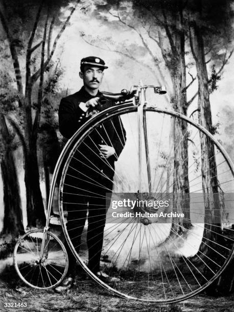 Mr Henry Davies with a Penny Farthing bicycle.