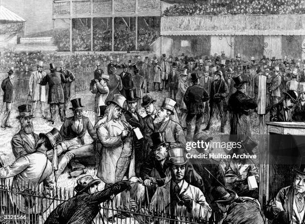 Bookmakers at work in the betting ring on Derby day, at Epsom. Original Publication: The Graphic