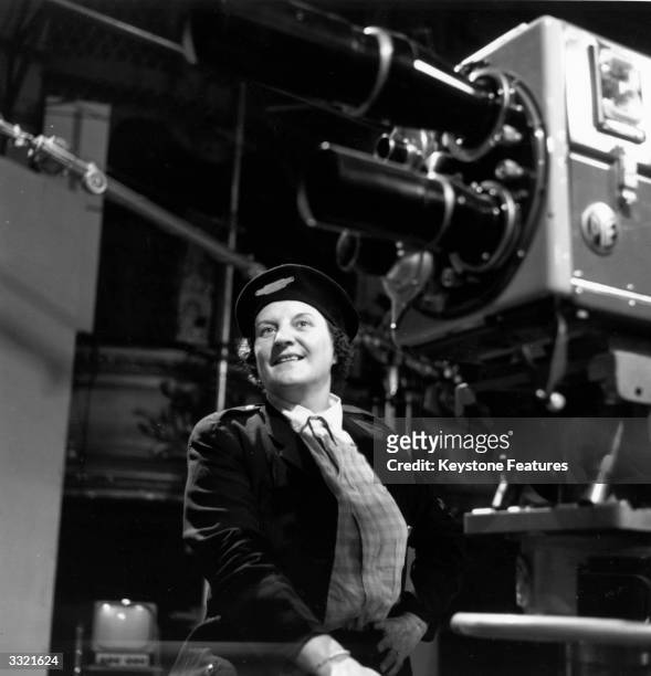 Jill Summers beside a television camera during recording of her 'Portress' act for her show 'Summers Here' at ITV Studios, Wood Green, north London.