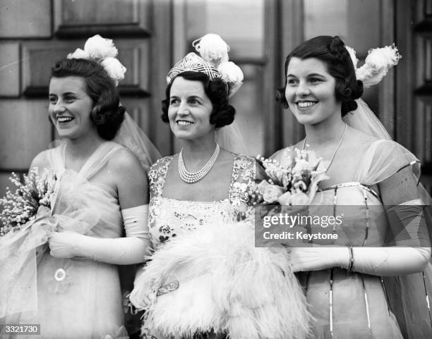 Rose Kennedy , wife of multi-millionaire and US ambassador to Britain Joseph Kennedy, and two of her daughters, Kathleen Kennedy and Rosemary Kennedy...