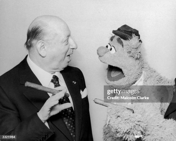 Lord Lew Grade meets Fozzie Bear from the 'Muppet Show' at the Variety Club of Great Britain Show Business Awards Luncheon at the Savoy Hotel, London.