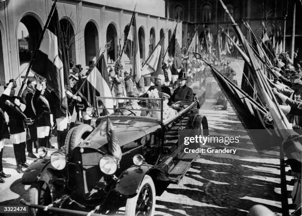 President Hindenburg of Germany driving through the streets of Cologne with the Burgomaster Dr Konrad Adenauer .